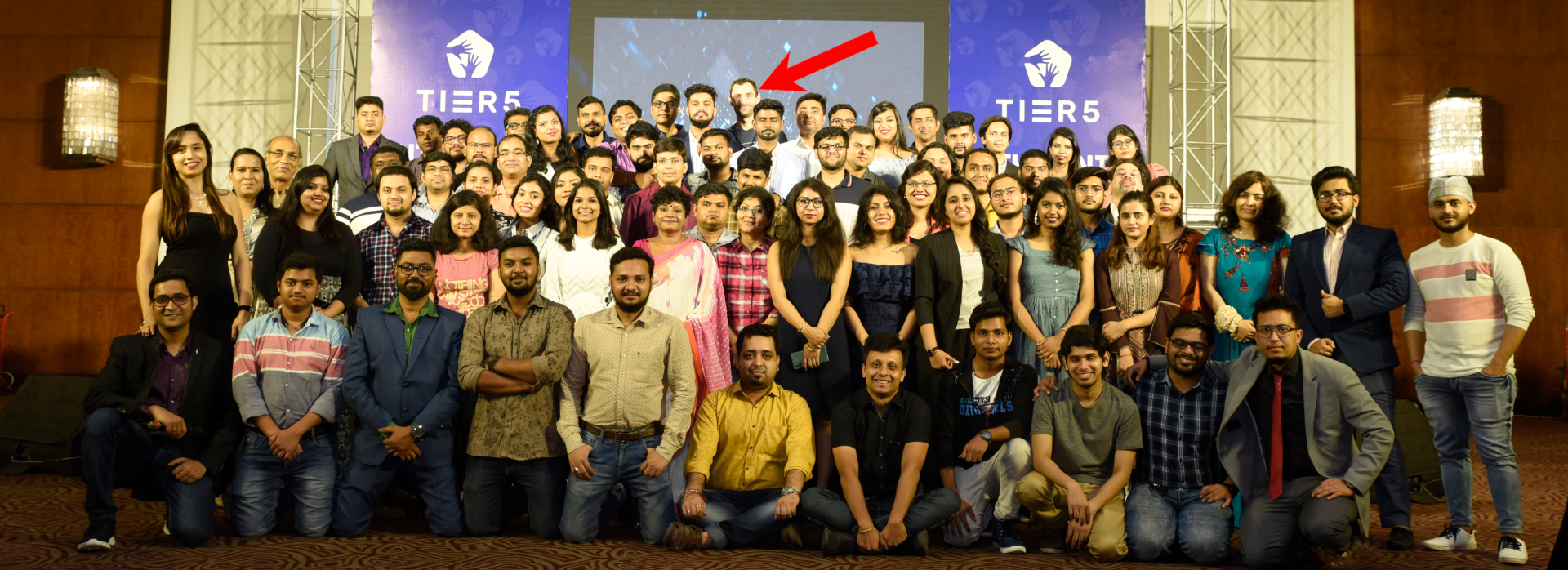 Jon Vaughn with the Tier5 team — a real 70+ person company built by the MIFGE founders